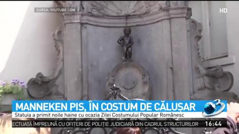 Celebrul Mannecken Pis din Bruxelles, costumat &icirc;n călușar