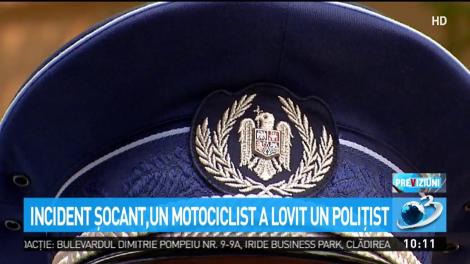 Incident şocant, un motocilisct a lovit un poliţist