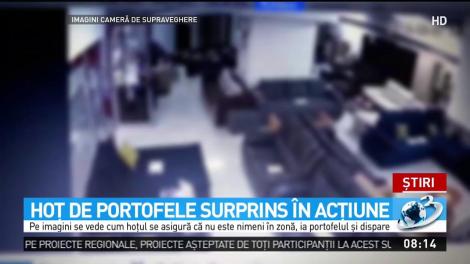 Hoţ de portofele surprins &icirc;n acţiune la un magazin din portofele