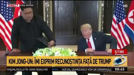 Donald Trump și Kim Jong Un semnează un document important