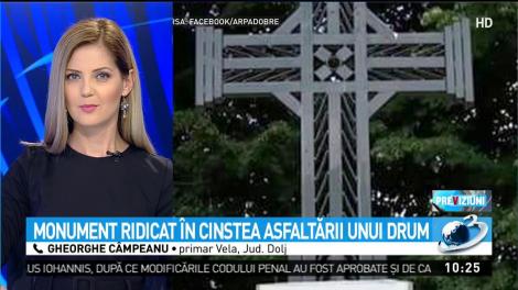 Cruce ridicată &icirc;n cinstea unui drum asfaltat din judeţul Dolj