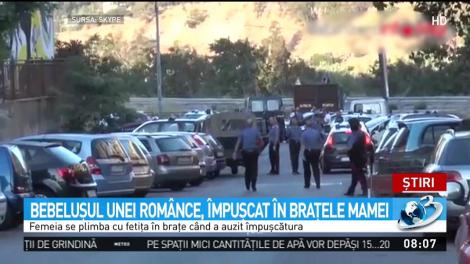 Bebeluşul unei românce, împuşcat în braţele mamei