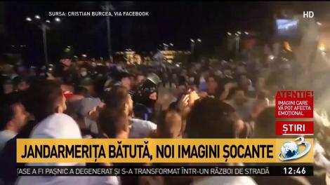 Noi imagini cu femeia-jandarm bătută &icirc;n Piața Victoriei