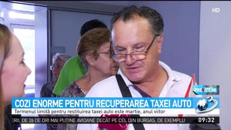 Cozi enorme pentru recuperarea taxei auto