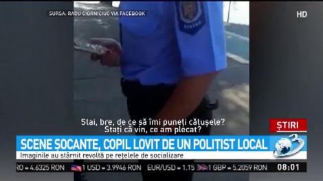 Scene şocante, copil lovit de un poliţist local