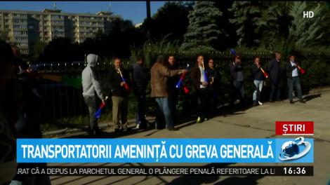 Transportatorii ameninţă cu greva generală