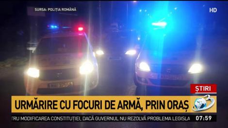 Urmărire cu focuri de armă, prin oraș
