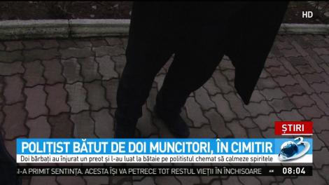 Poliţist bătut de doi muncitori, &icirc;n cimitir