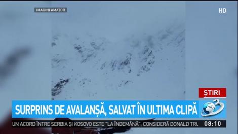 Surprins de avalanşă, salvat &icirc;n ultimul moment