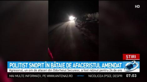 Poliţist snopit &icirc;n bătaie de afaceristul amendat