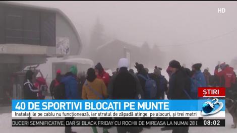 40 de sportivi blocați pe munte