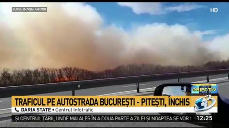 Incendiu puternic &icirc;n apropiere de autostrada București-Pitești. Traficul a fost oprit