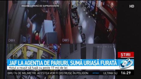 Imagini din timpul jafului de la o casă de paruri din T&acirc;rgu Jiu