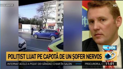 Video. Un șofer nervos ia un polițist local pe capotă și pleacă în trombă! S-au tras focuri de armă