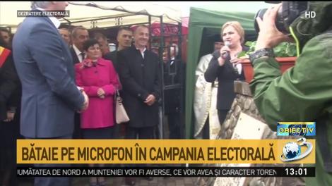 Bătaie pe microfon &icirc;n campania electorală: senatoarea PNL Carmen Hărău i-a luat microfonul lui Eugen Teodorovici