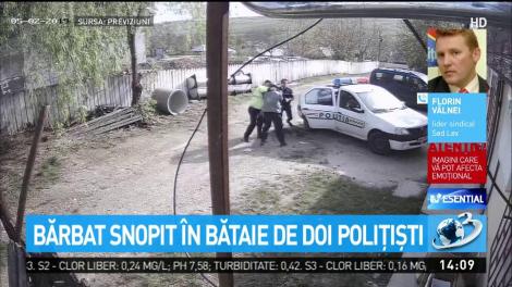 Doi polițiști, surprinși în timp ce snopeau în bătaie un bărbat! Incidentul s-a petrecut chiar în curtea secției