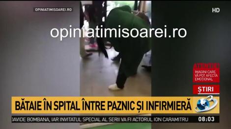 O infirmieră și un paznic s-au luat la bătaie, chiar în holul spitalului! Atenție, imagini care vă pot afecta emoțional! 