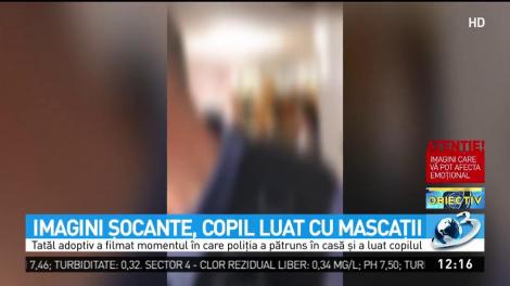 Imagini șocante. Copil luat din casă cu mascații