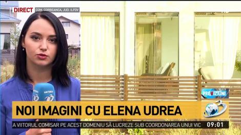 Noi imagini cu Elena Udrea în vila sa din Corbeanca. Cu copilul în brațe, fostul ministru le-a făcut cu mâna jurnaliștilor