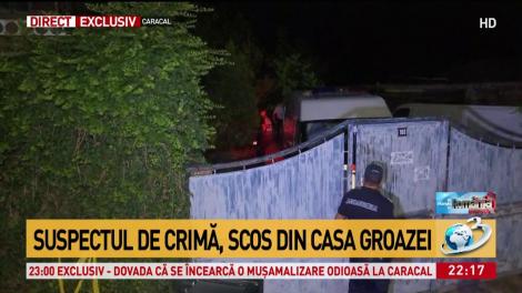 Gheorghe Dincă, presupusul ucigaș din Caracal, scos din casa groazei. Oamenii îl huiduie la locul crimei