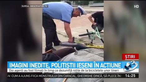 Imagini revoltătoare cu doi poliţişti filmaţi &icirc;n timp ce dezumflau roţile de la bicicletele unor tineri
