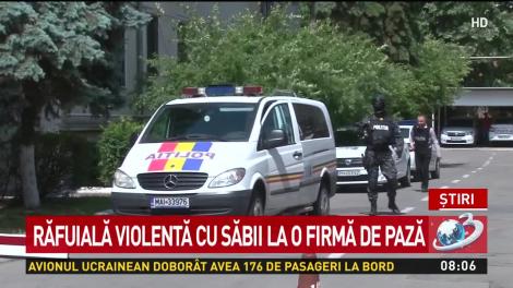 Răfuială violentă cu săbii la o firmă de pază din București