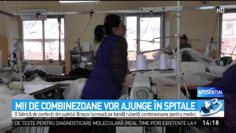 O fabrică de confecții din Codlea croieşte combinezoane pe bandă rulantă, pentru spitalele din țară