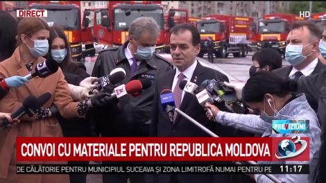 Ludovic Orban şi-a dat jos masca de protecţie şi i-a înmânat-o ministrului Vela