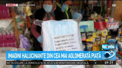 Comercianții din Piața Obor vând măști atârnate pe sârmă, fără ambalaj: "Le-am expus să le vadă, mai am aici, jos!" Imagini filmate cu camera ascunsă