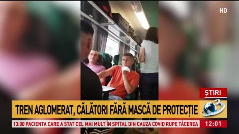 Situație revoltătoare în tren. Călătorii nu poartă mască, stau înghesuiți și se bat pe locuri- VIDEO