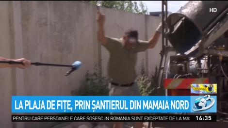 Drumul turişilor spre plaja de fiţe din Mamaia, printre utilaje de construcţii: ''Am luat ţeapă!''