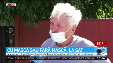 Sătenii respectă regulile şi poartă masca de protecţie