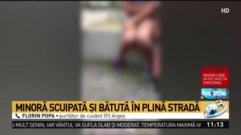 Minoră scuipată și bătută &icirc;n plină stradă! Imagini cu puternic impact emoțional