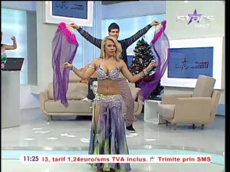 Jasmine dă trezirea în paşi de belly dance