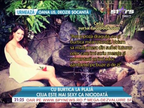 Celia, cu burtica la plajă
