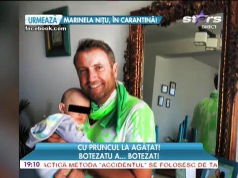 Cătălin Botezatu, cu un prunc în brațe