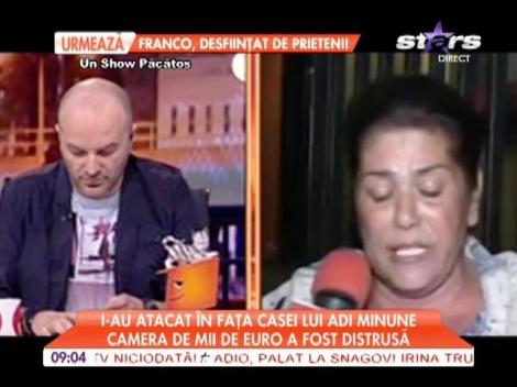 Reporter agresat în faţa casei lui Adrian Minune