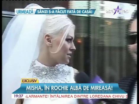 Misha, în rochie albă de mireasă