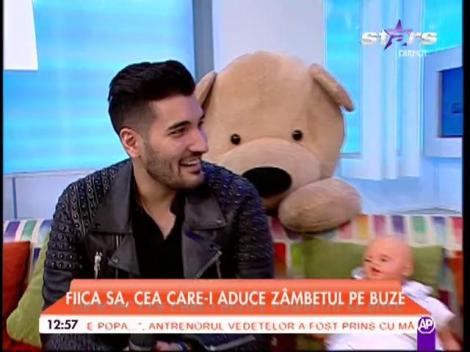 Nadir, un tătic neconveţional! A demonstrat că ştie să îmbrace un bebeluş!