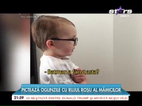 Batman pictează oglizile cu ruj!