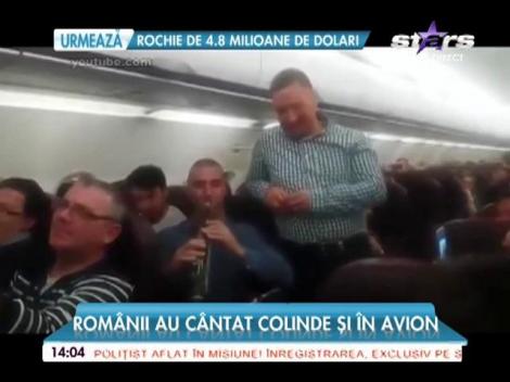 Românii au cântat colinde în avion