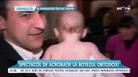 Spectacol de acrobație la botezul ortodox!