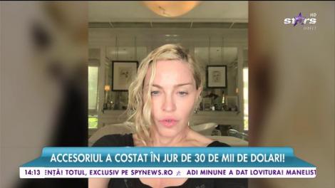 Madonna şochează din nou, de data asta prin zâmbet!