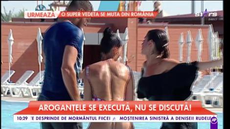 Natalia Mateuţ şi Răzvan Botezatu, STARoganţă de zil mari. Cei doi prezentatori au sărit îmbrăcaţi în piscină