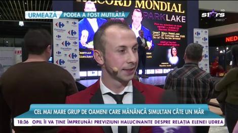 Cea mai mare lecție de nutriție. Cel mai mare grup de oameni care mănâncă simultan câte un măr