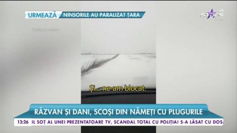Răzvan și Dani, scoși din nămeți cu plugurile. Imagini cu operațiunea de salvare a prezentatorilor