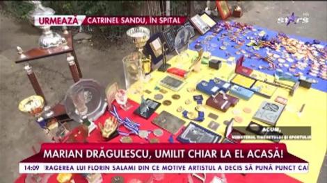 Marian Drăgulescu, umilit chiar la el acasă. Din disperare, gimnastul şi-a întins medaliile pe stradă