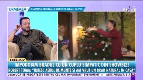 Robert Toma a împodobim bradul de Crăciun cu echipa "Răi, Da' Buni"