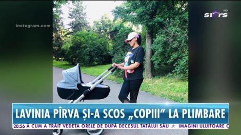 Lavinia Pîrva, cu copilul şi căţelul la plimbare!