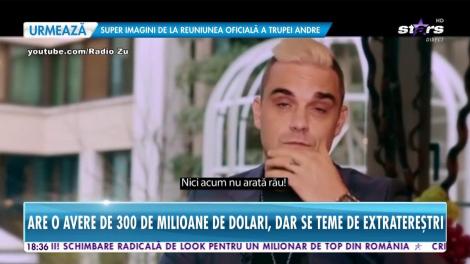 Star News. Robbie Williams şi-a angajat o armată de bodyguarzi pentru a nu fi răpit de extratereştri!